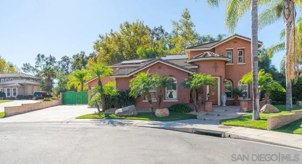 197 Double Eagle Glen Escondido, CA 92026 - Photo 37 of 70 a view of a house with a yard and palm trees