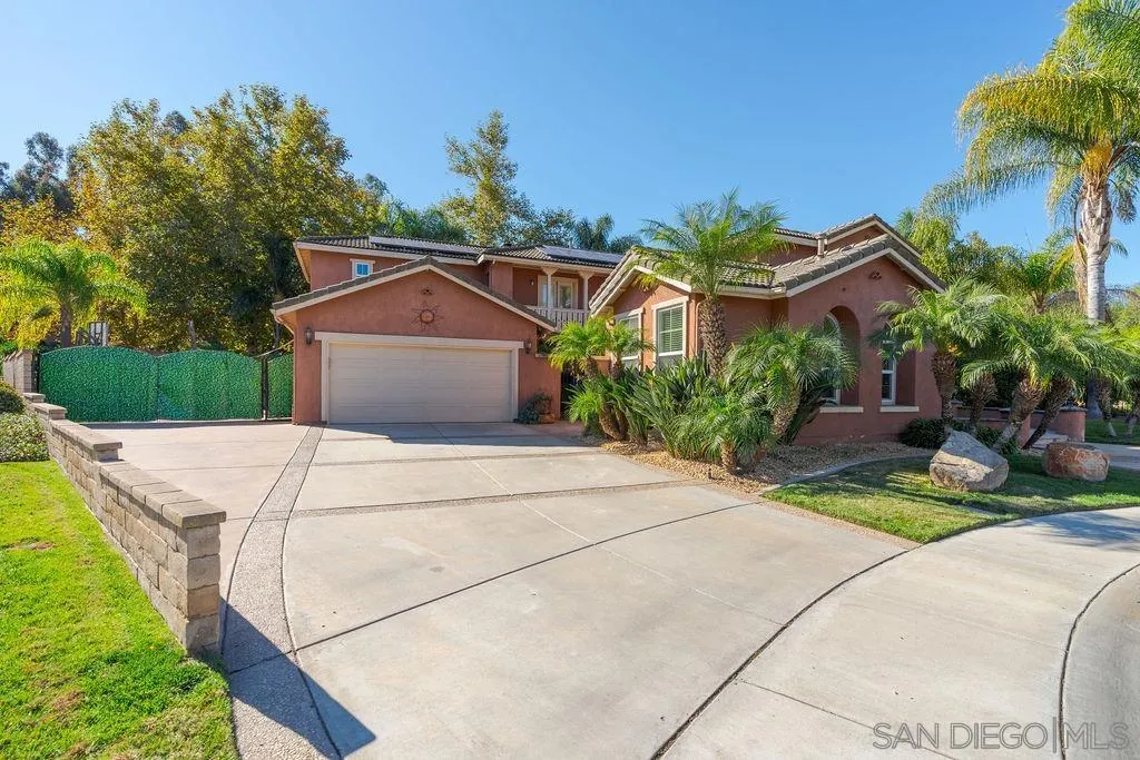 197 Double Eagle Glen Escondido, CA 92026 - Photo 39 of 70 a front view of a house with a garden