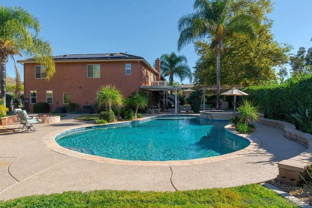 197 Double Eagle Glen Escondido, CA 92026 - Photo 45 of 70 a view of pool with lawn chairs and plants