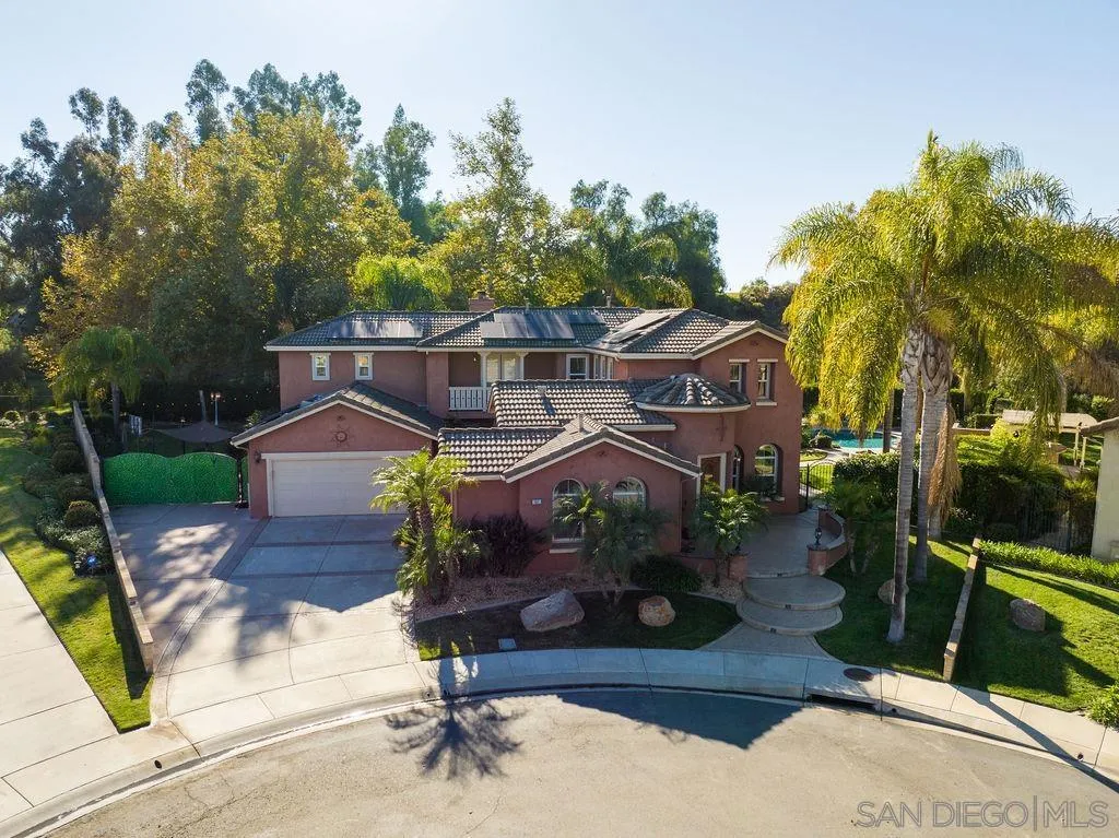 197 Double Eagle Glen Escondido, CA 92026 - Photo 57 of 70 an aerial view of a house with garden space and street view