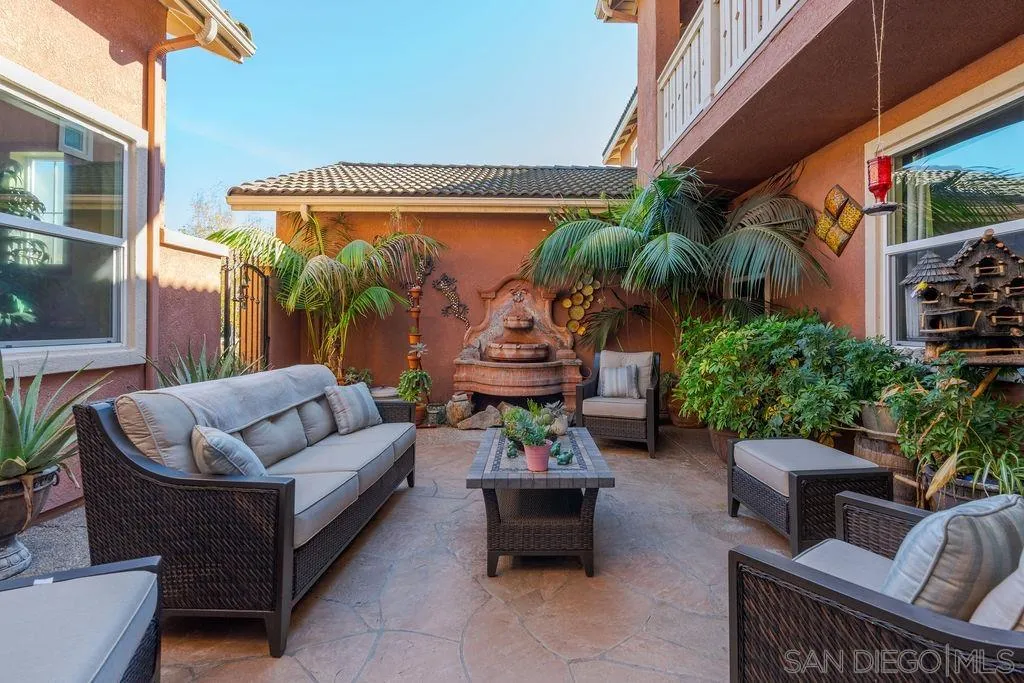 197 Double Eagle Glen Escondido, CA 92026 - Photo 8 of 70 a view of a patio with couches and a potted plant on a table