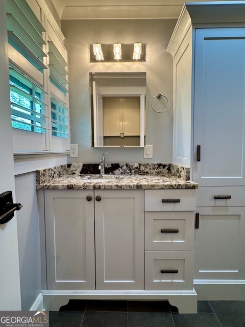 360 Morgan Mill Road Brooks, GA 30205 - Photo 25 of 87 a bathroom with a sink and a mirror