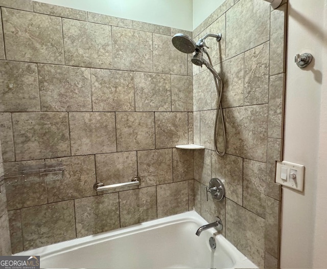 360 Morgan Mill Road Brooks, GA 30205 - Photo 34 of 87 a bathroom with a shower and a tiled wall