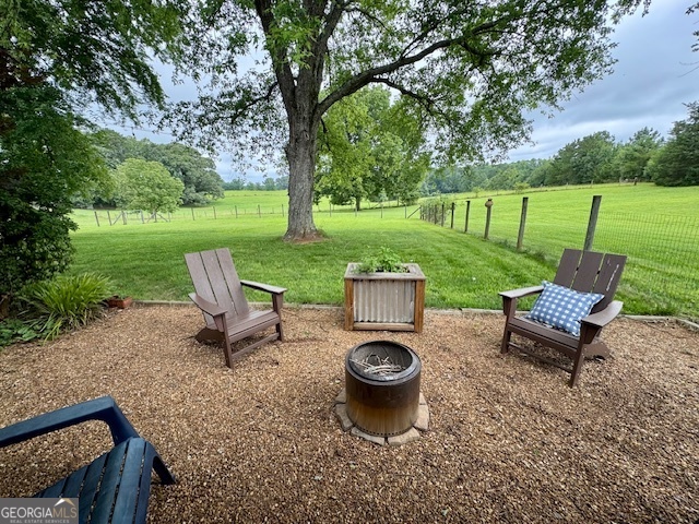 360 Morgan Mill Road Brooks, GA 30205 - Photo 58 of 87 a view of a garden with furniture and garden