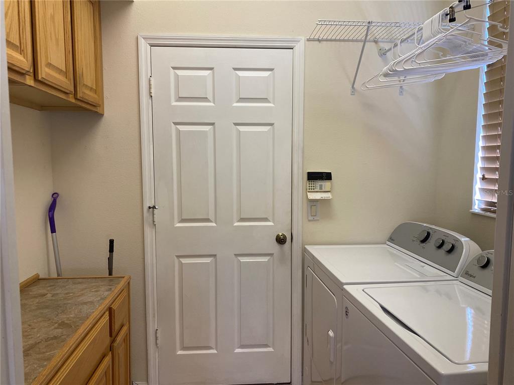 6372 Rookery Circle Bradenton, FL 34203 - Photo 23 of 46 a utility room with dryer and washer