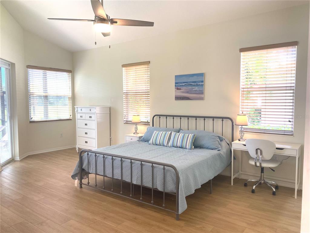 6372 Rookery Circle Bradenton, FL 34203 - Photo 30 of 46 a bedroom with a bed and a table