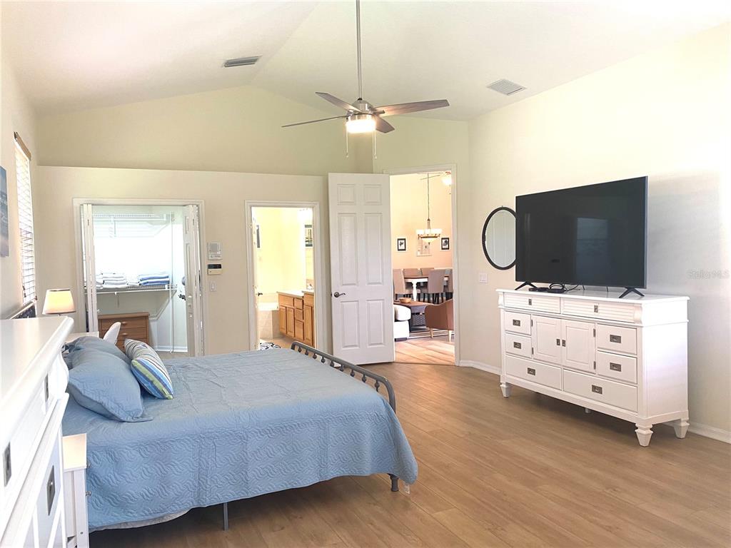 6372 Rookery Circle Bradenton, FL 34203 - Photo 31 of 46 a bedroom with furniture and flat screen tv