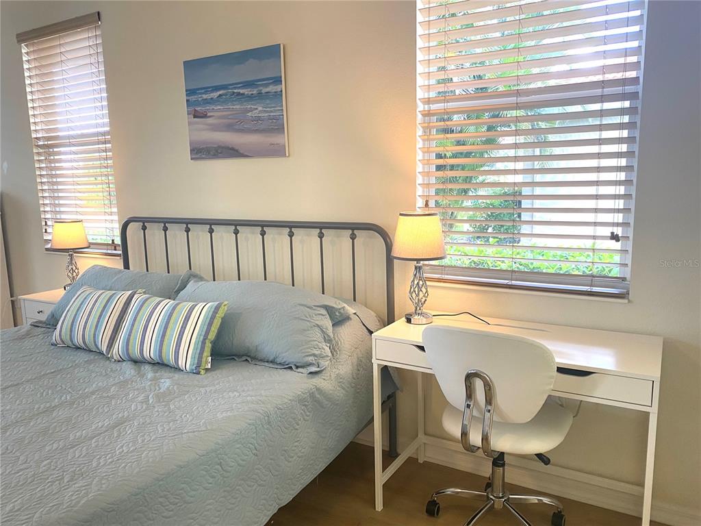 6372 Rookery Circle Bradenton, FL 34203 - Photo 33 of 46 a bed sitting in a bedroom next to a window