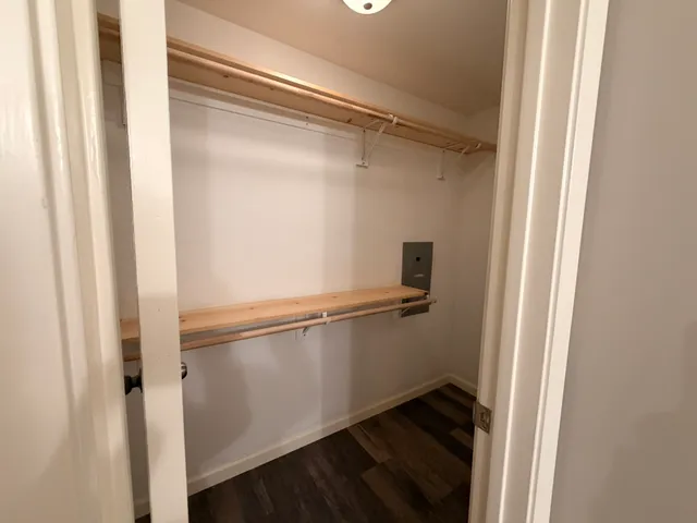 a view of an empty walk in closet