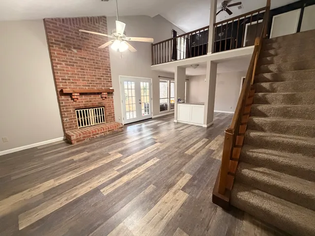 a view of entryway with wooden floor