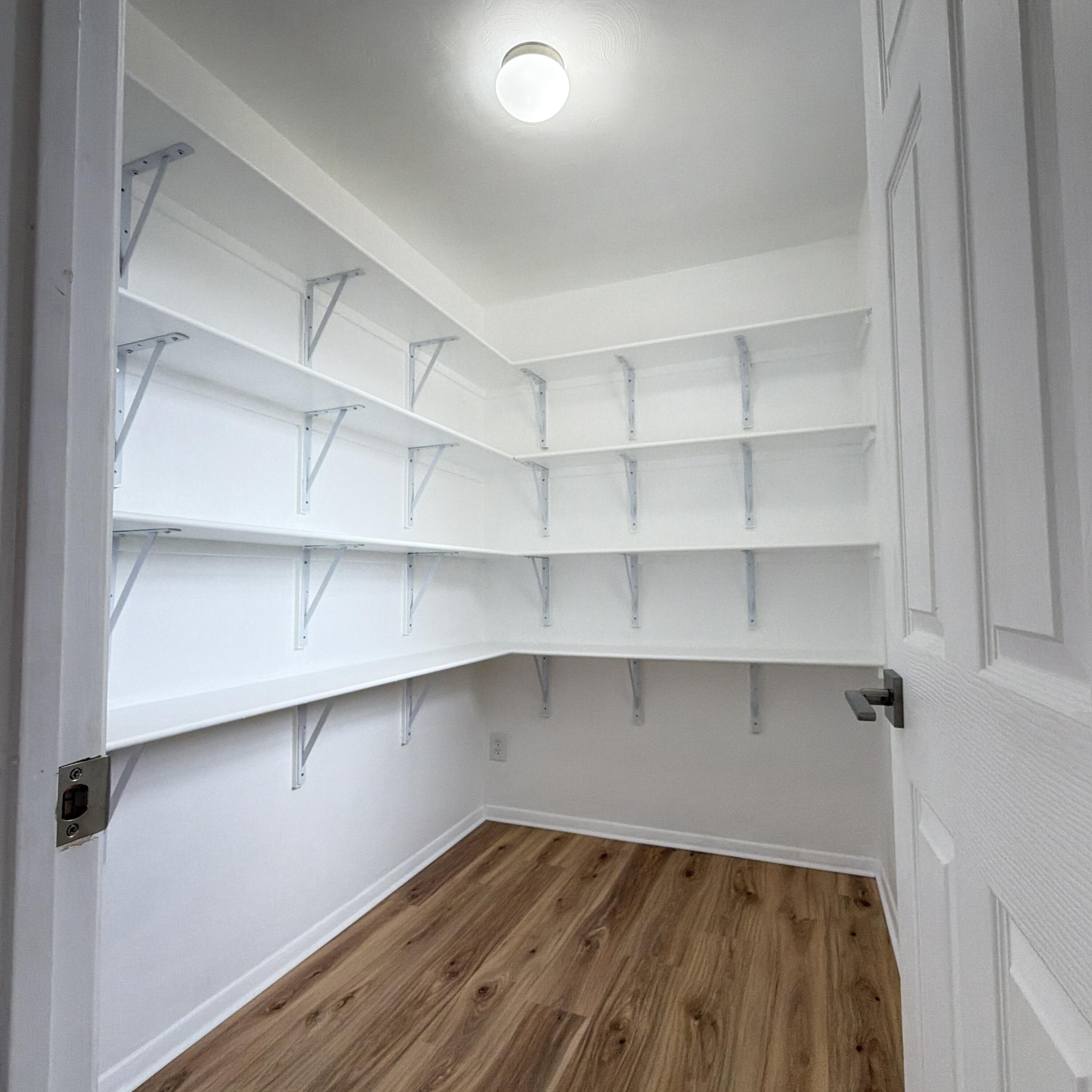 1312 Culpepper Avenue Wilson, TX 79381 - Photo 16 of 27 a view of a room with shelf on the wall