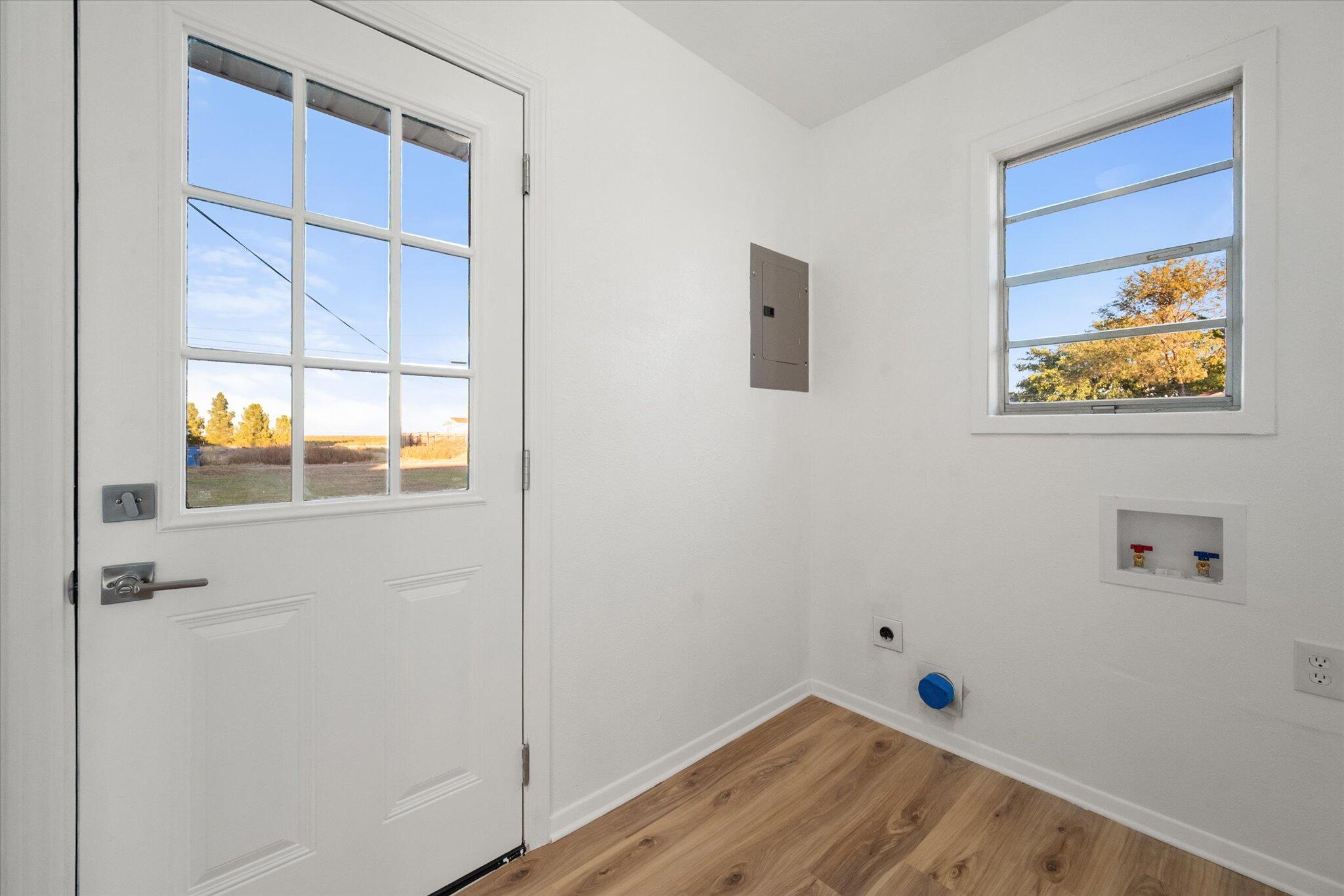 1312 Culpepper Avenue Wilson, TX 79381 - Photo 22 of 27 a view of small space with wooden floor and windows