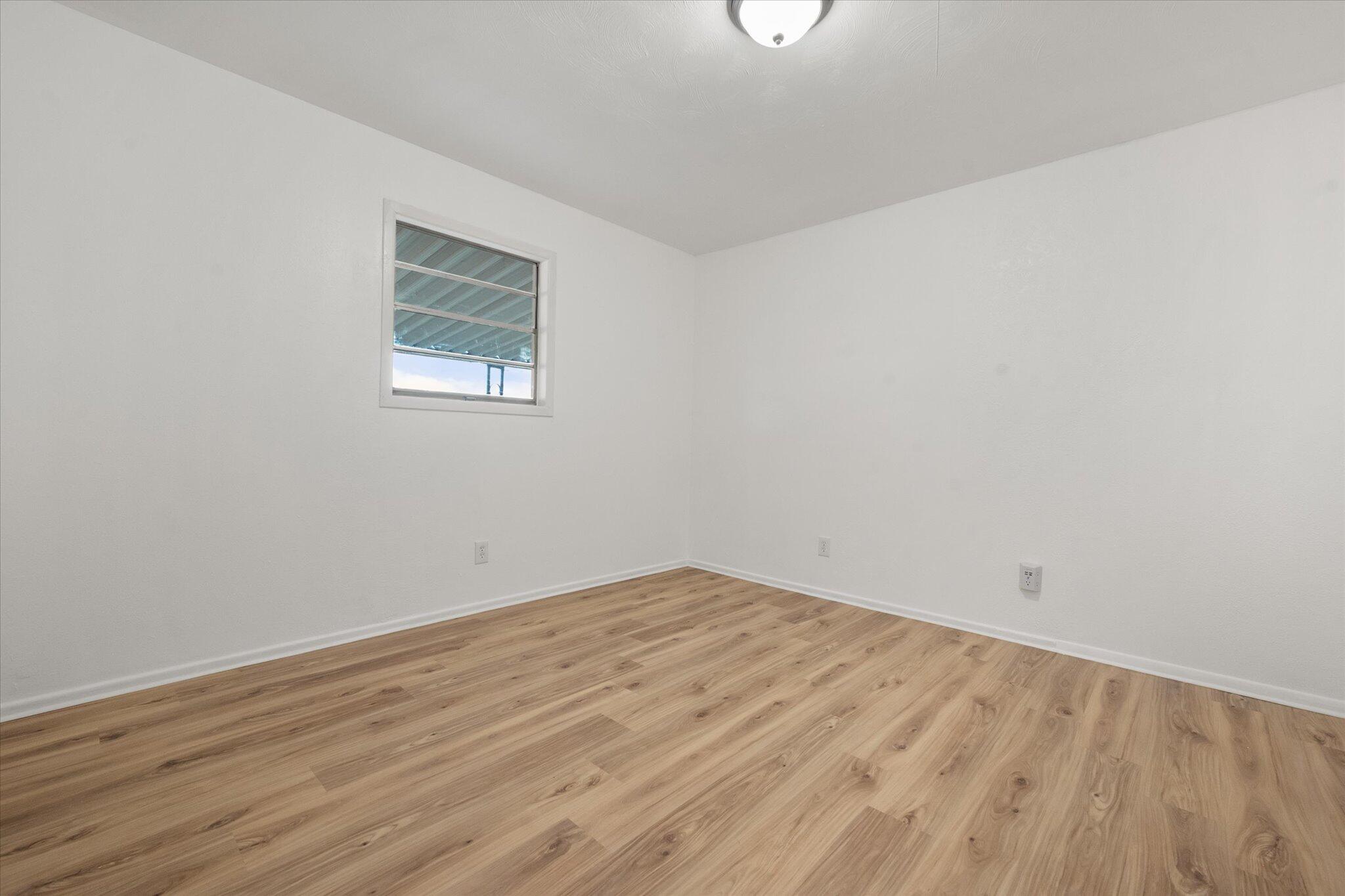 1312 Culpepper Avenue Wilson, TX 79381 - Photo 27 of 27 wooden floor in a room