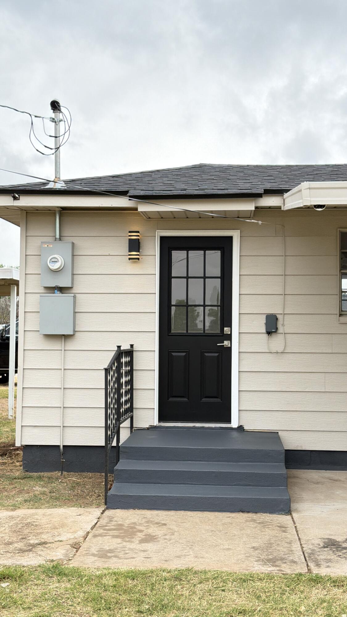 1312 Culpepper Avenue Wilson, TX 79381 - Photo 8 of 27 a front view of a house with a yard