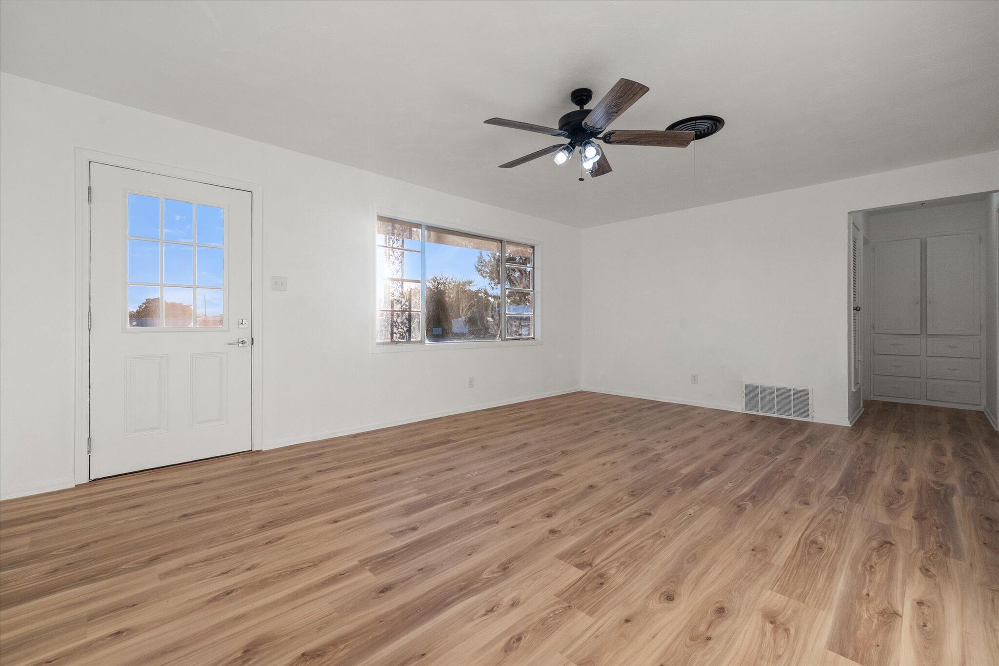 1312 Culpepper Avenue Wilson, TX 79381 - Photo 9 of 27 a view of empty room with wooden floor