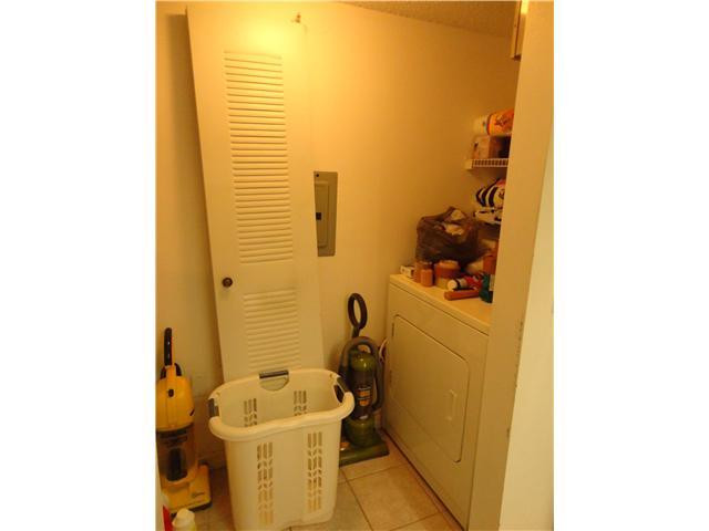 5055 Wiles Road, Unit 104 Coconut Creek, FL 33073 - Photo 14 of 21 Laundry Room