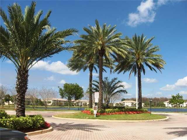 5055 Wiles Road, Unit 104 Coconut Creek, FL 33073 - Photo 2 of 21 Exterior Front