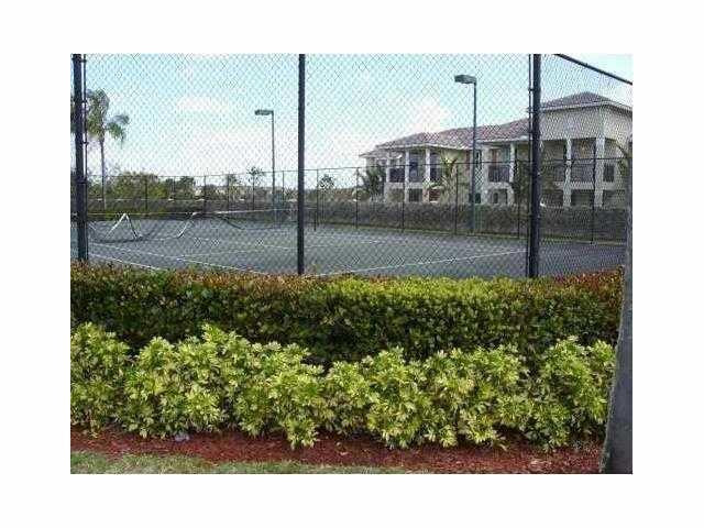 5055 Wiles Road, Unit 104 Coconut Creek, FL 33073 - Photo 5 of 21 Tennis Court