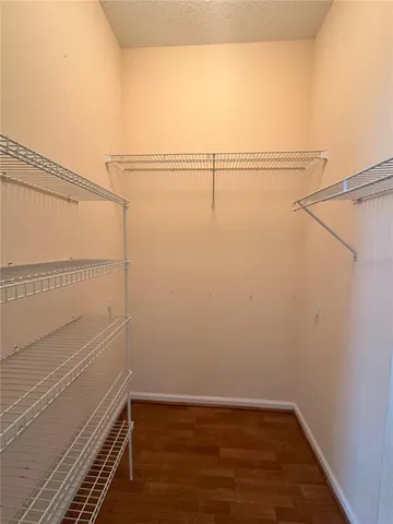 a view of a room with racks on the wall