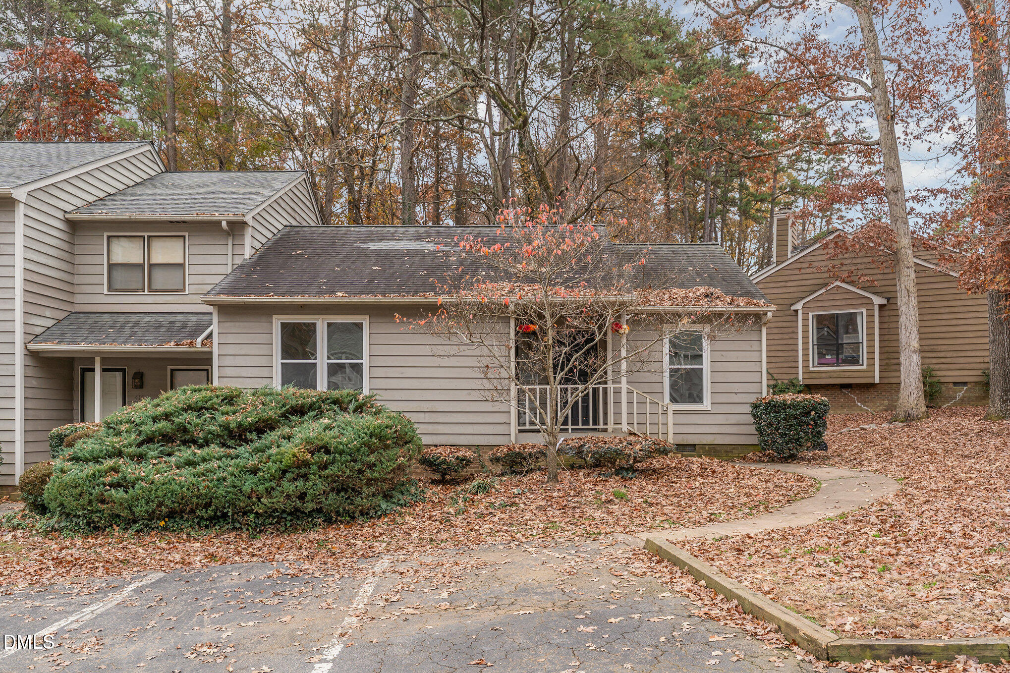 417 Applecross Drive Cary, NC 27511 - Photo 1 of 24 a front view of a house with garden