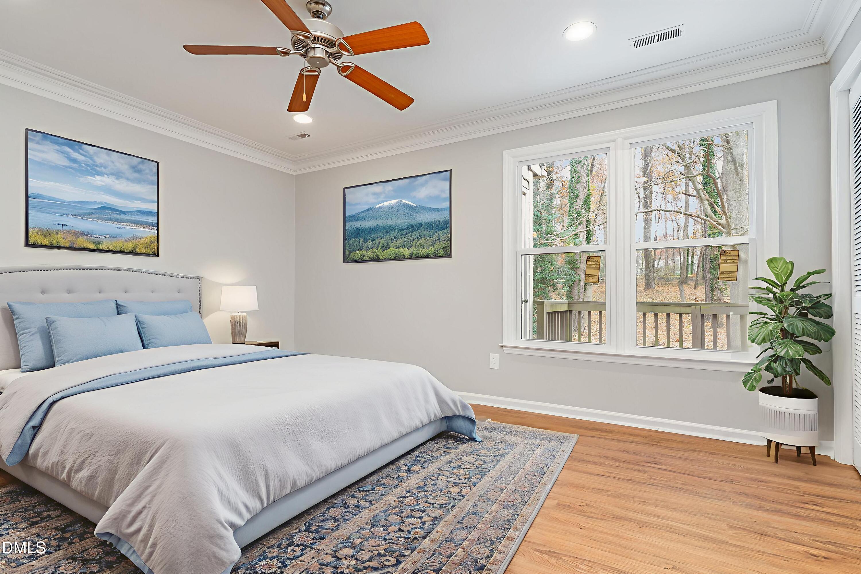 417 Applecross Drive Cary, NC 27511 - Photo 10 of 24 a bedroom with a large bed and a window