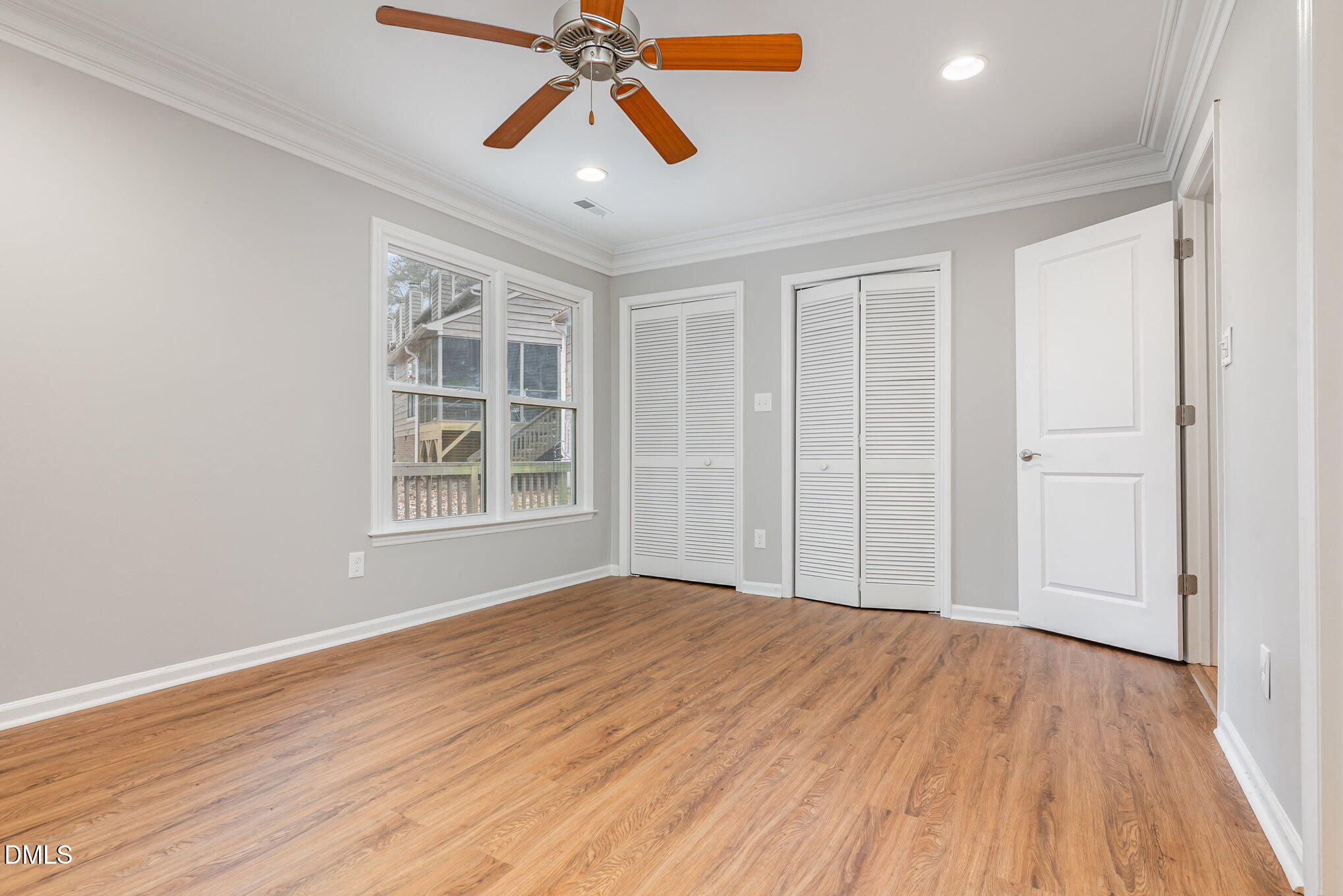 417 Applecross Drive Cary, NC 27511 - Photo 11 of 24 a view of empty room with wooden floor and fan