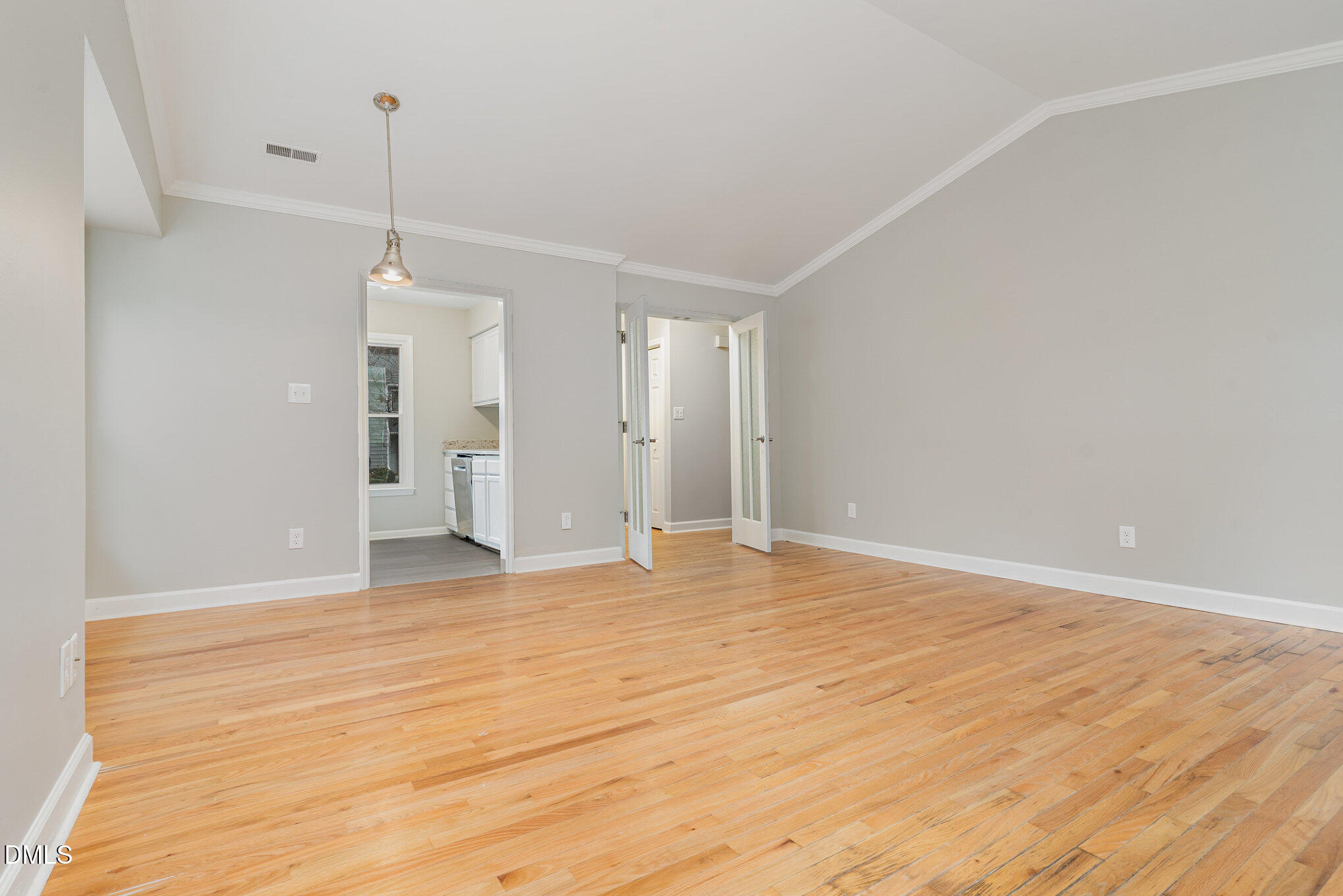 417 Applecross Drive Cary, NC 27511 - Photo 6 of 24 a view of empty room with wooden floor and fan