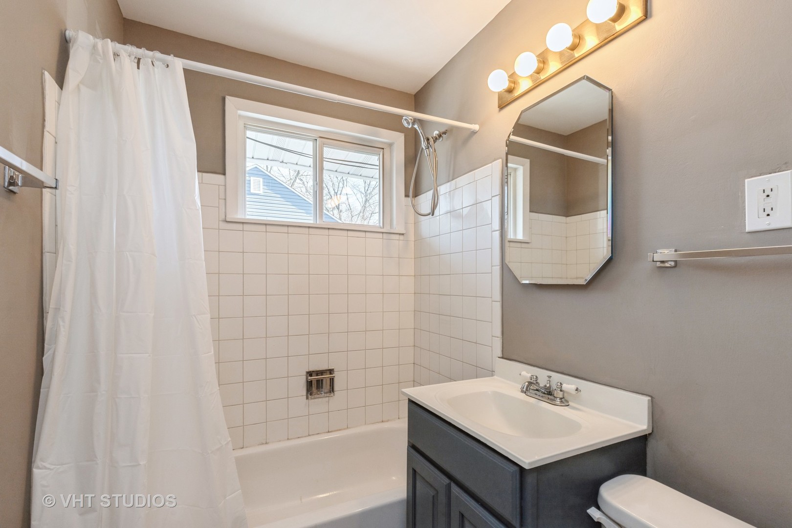 238 Allanson Road Mundelein, IL 60060 - Photo 16 of 18 a bathroom with a sink toilet and shower