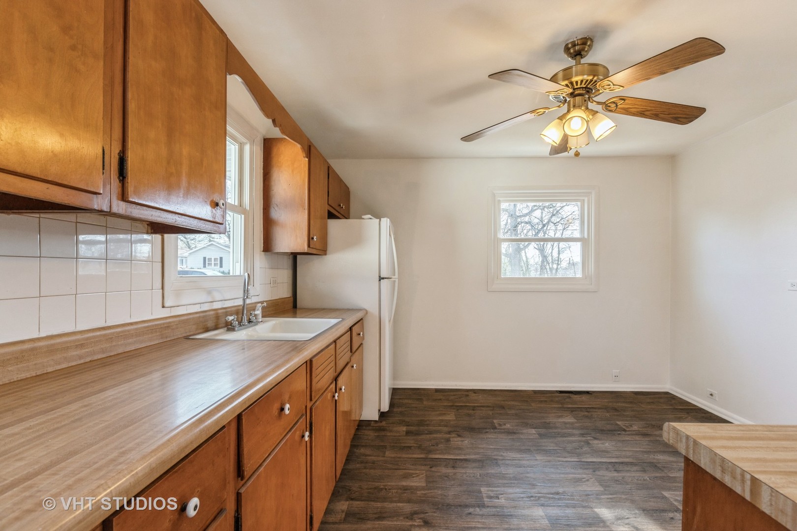238 Allanson Road Mundelein, IL 60060 - Photo 10 of 18 a kitchen with a sink cabinets and a window
