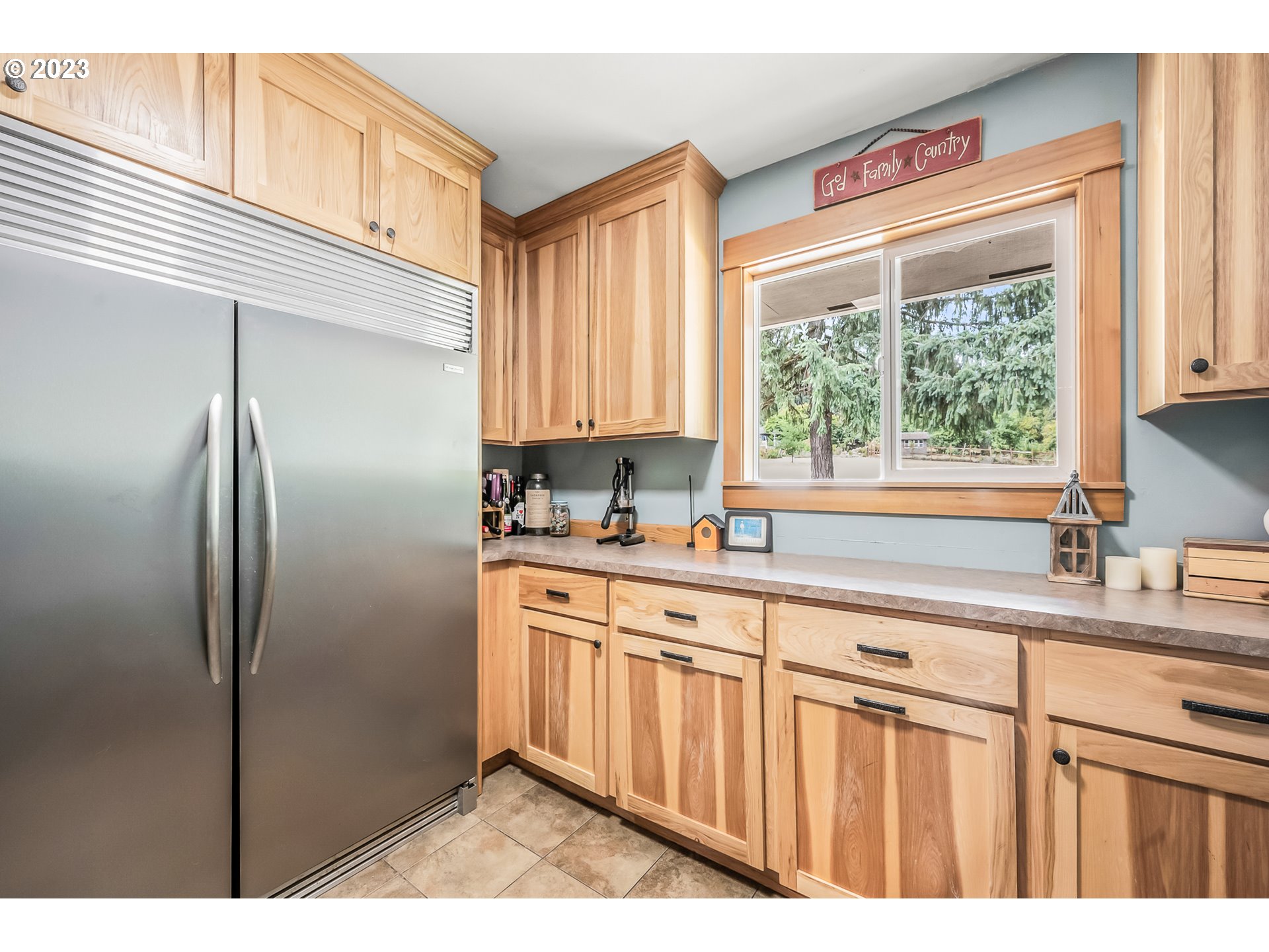 32311 Viewcrest Drive Warren, OR 97053 - Photo 15 of 46 a kitchen with stainless steel appliances a sink cabinets and a window