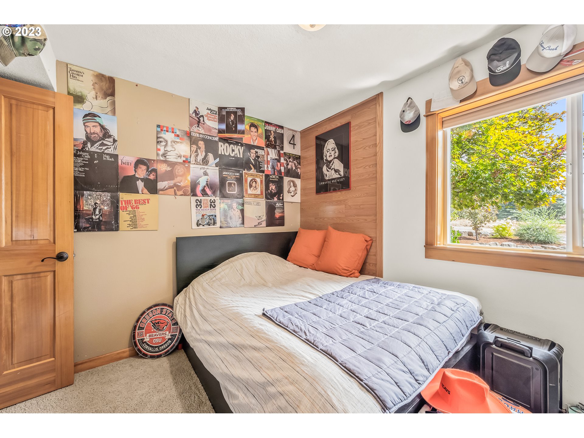 32311 Viewcrest Drive Warren, OR 97053 - Photo 22 of 46 a bedroom with a bed and a window