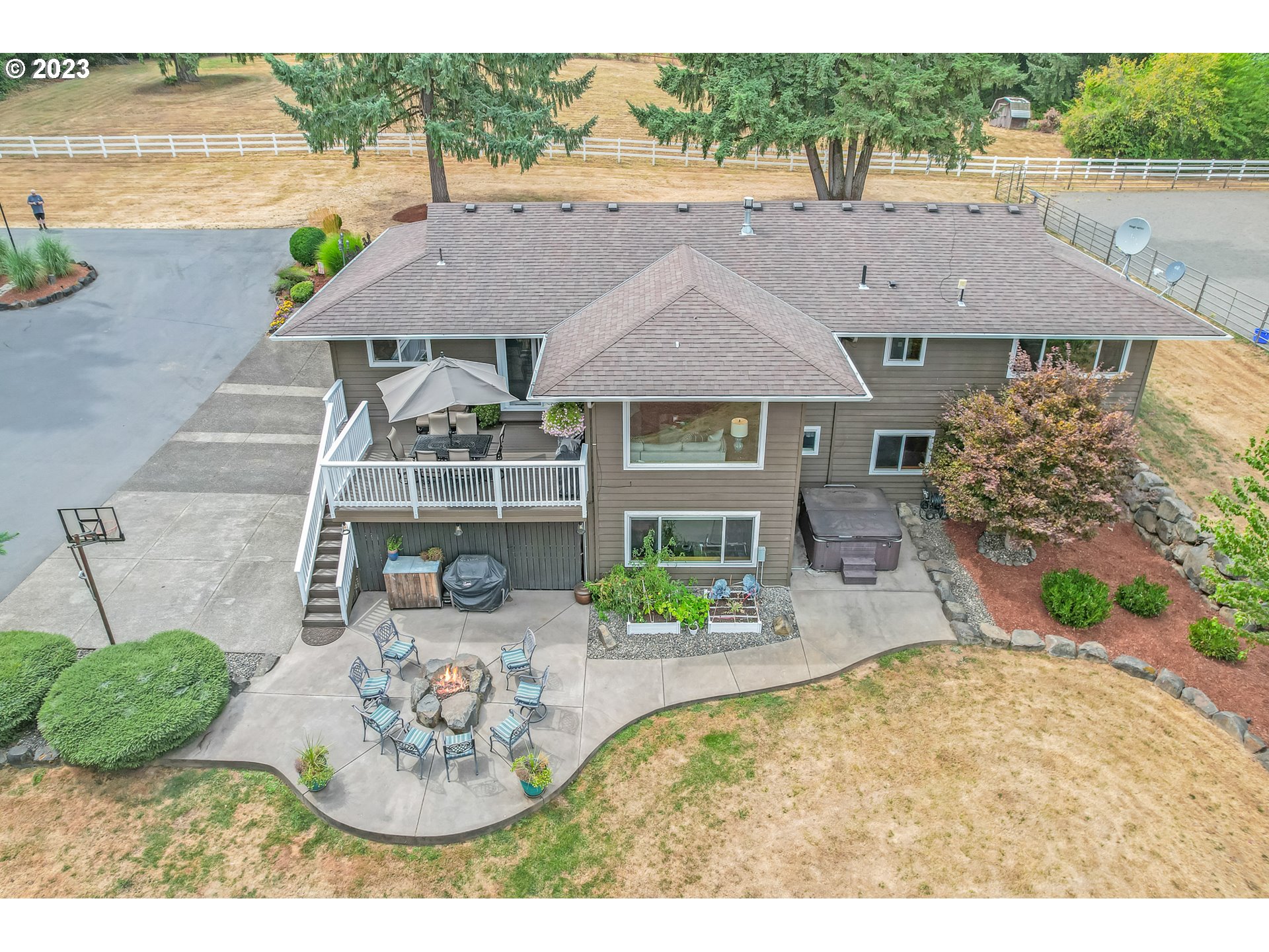 32311 Viewcrest Drive Warren, OR 97053 - Photo 32 of 46 an aerial view of a house with garden space and lake view