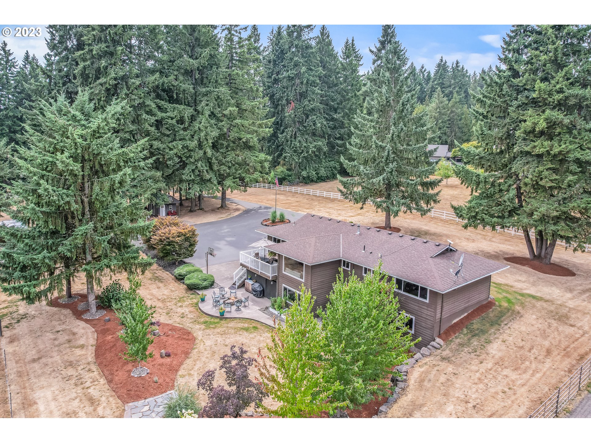 32311 Viewcrest Drive Warren, OR 97053 - Photo 36 of 46 an aerial view of a house with garden space and street view