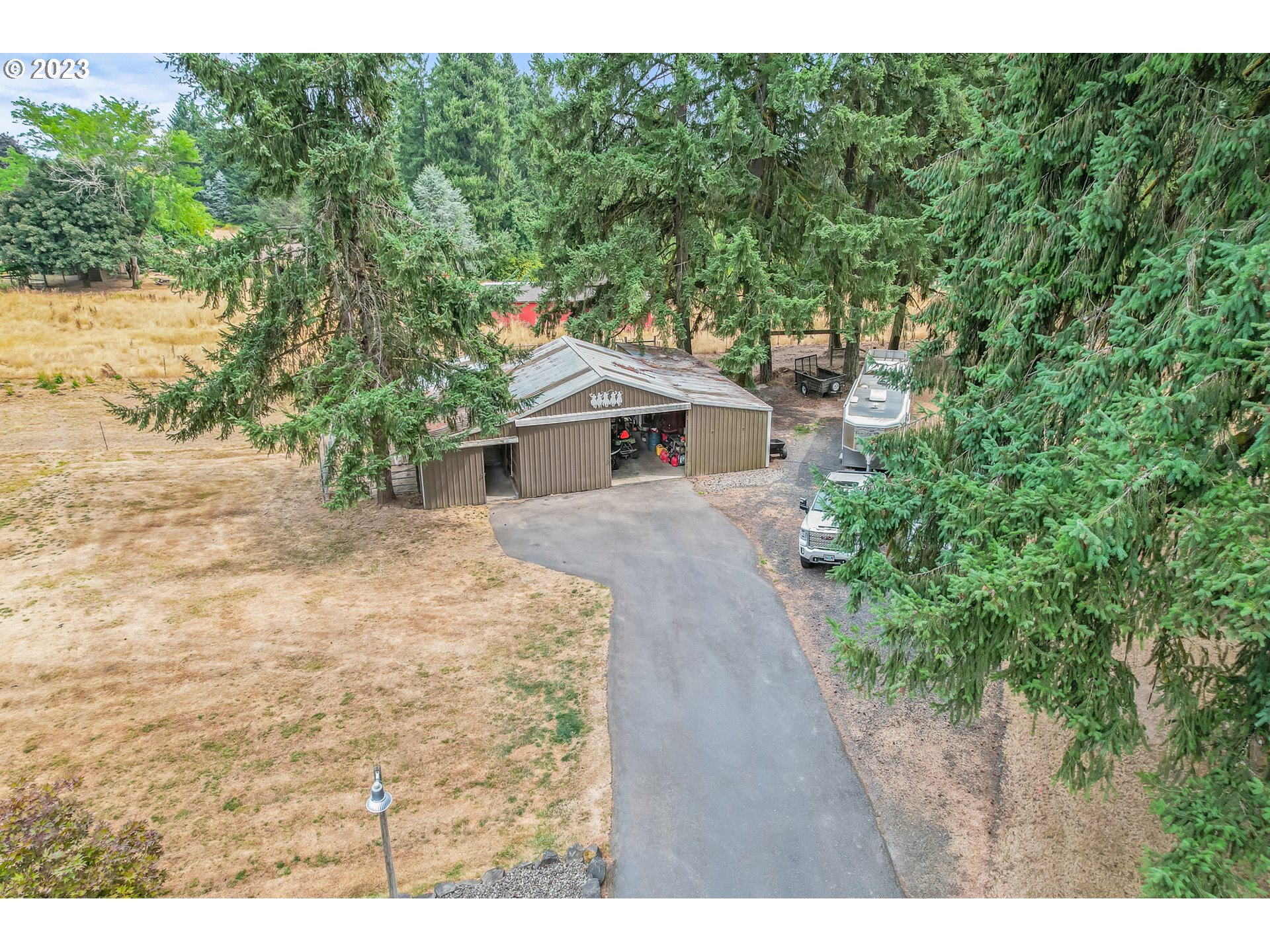 32311 Viewcrest Drive Warren, OR 97053 - Photo 38 of 46 a front view of a house with a garden