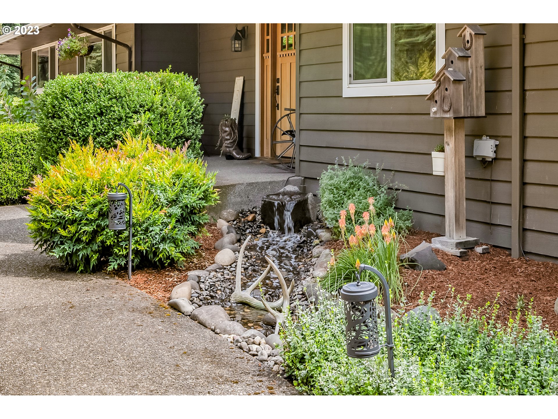 32311 Viewcrest Drive Warren, OR 97053 - Photo 7 of 46 a view of a backyard with potted plants