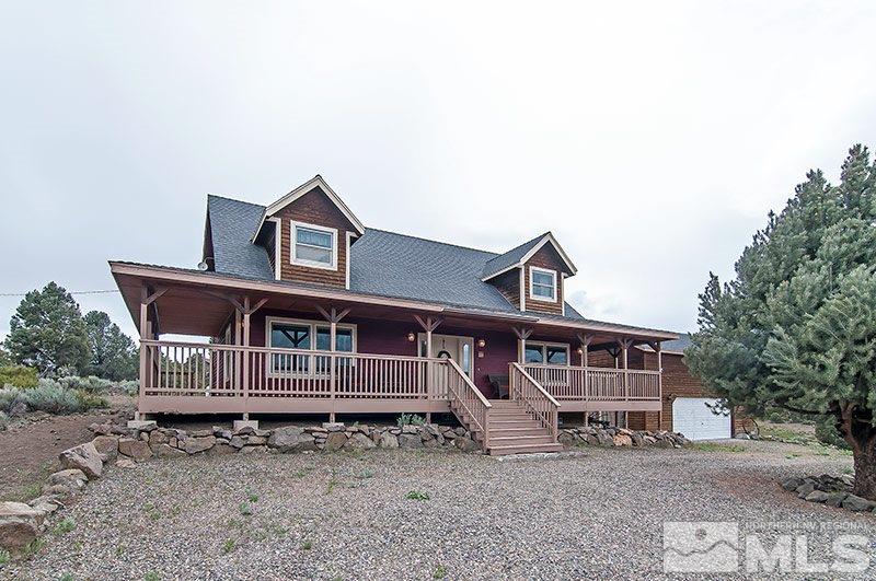 21765 Adobe Road Reno, NV 89521 - Photo 1 of 1 a front view of a house with a yard
