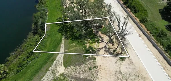 a pathway of a house with a yard