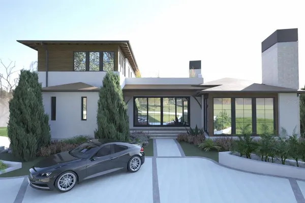 a front view of a house with outdoor space