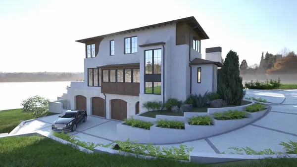 a front view of a house with yard