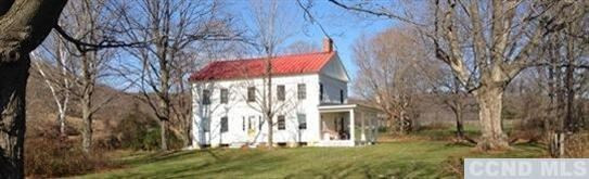 17 High Meadow Road Copake, NY 12516 - Photo 1 of 10 a view of a house with a yard