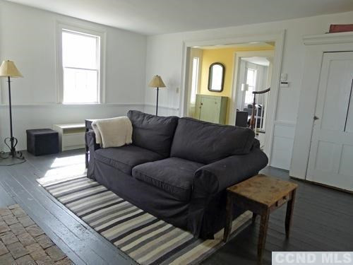 17 High Meadow Road Copake, NY 12516 - Photo 6 of 10 a living room with furniture and a wooden floor