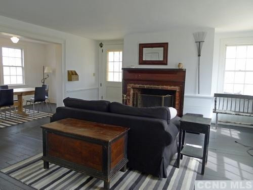 17 High Meadow Road Copake, NY 12516 - Photo 7 of 10 a living room with furniture and a fireplace