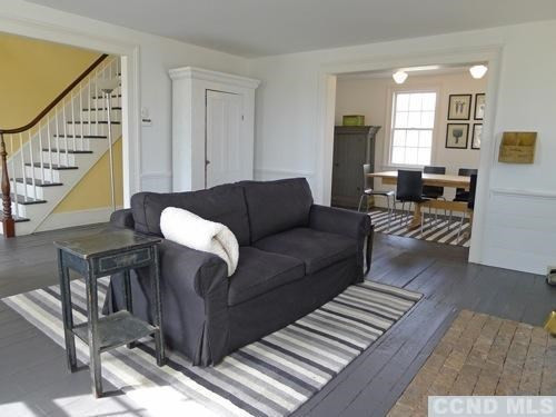 17 High Meadow Road Copake, NY 12516 - Photo 9 of 10 a living room with furniture and wooden floor