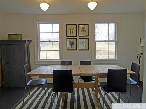 17 High Meadow Road Copake, NY 12516 - Photo 10 of 10 a view of a dining room with furniture and window