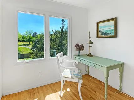 a room with furniture and a window