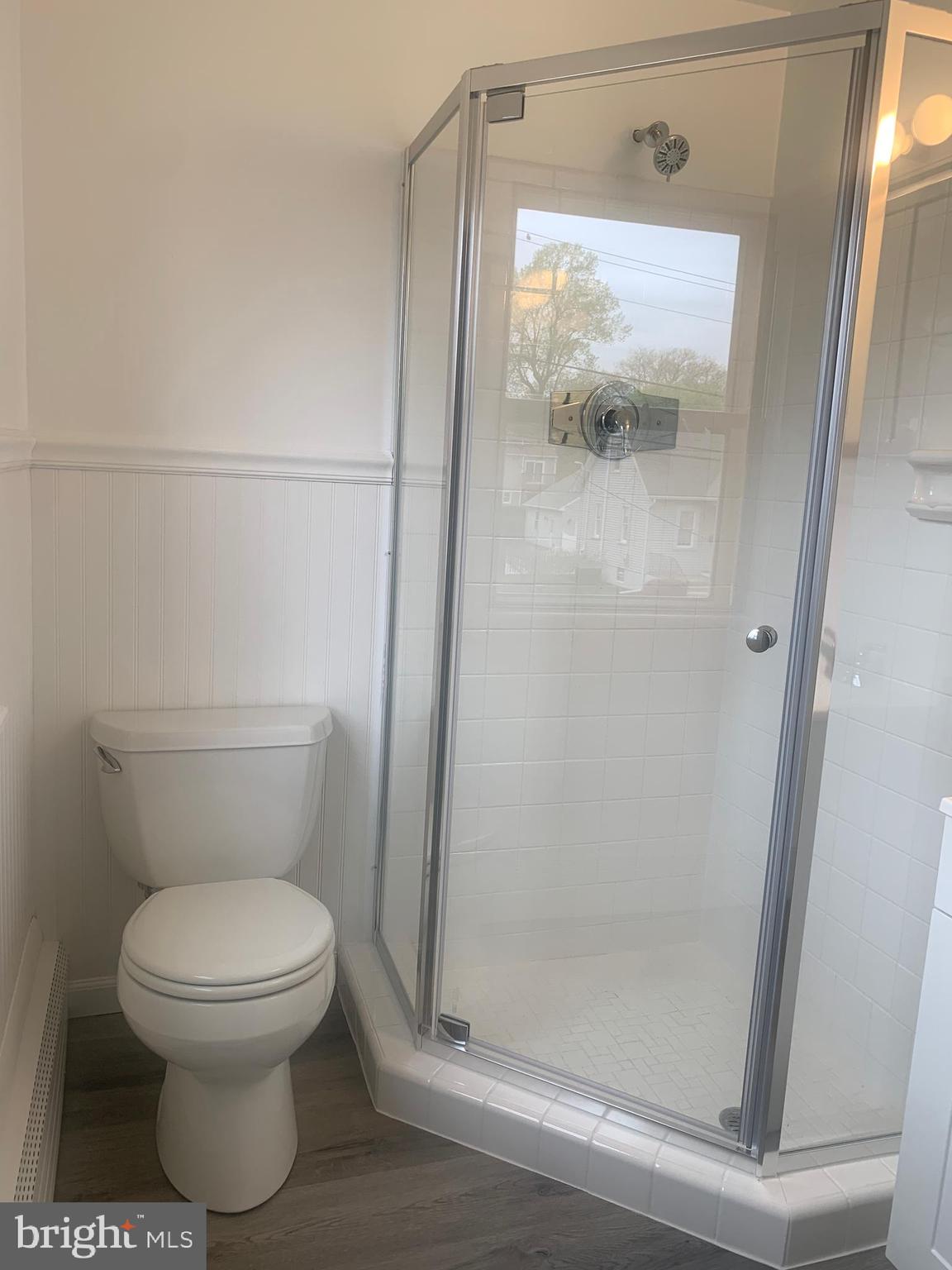 158 South Highland Road Springfield, PA 19064 - Photo 32 of 46 a bathroom with a toilet and a shower