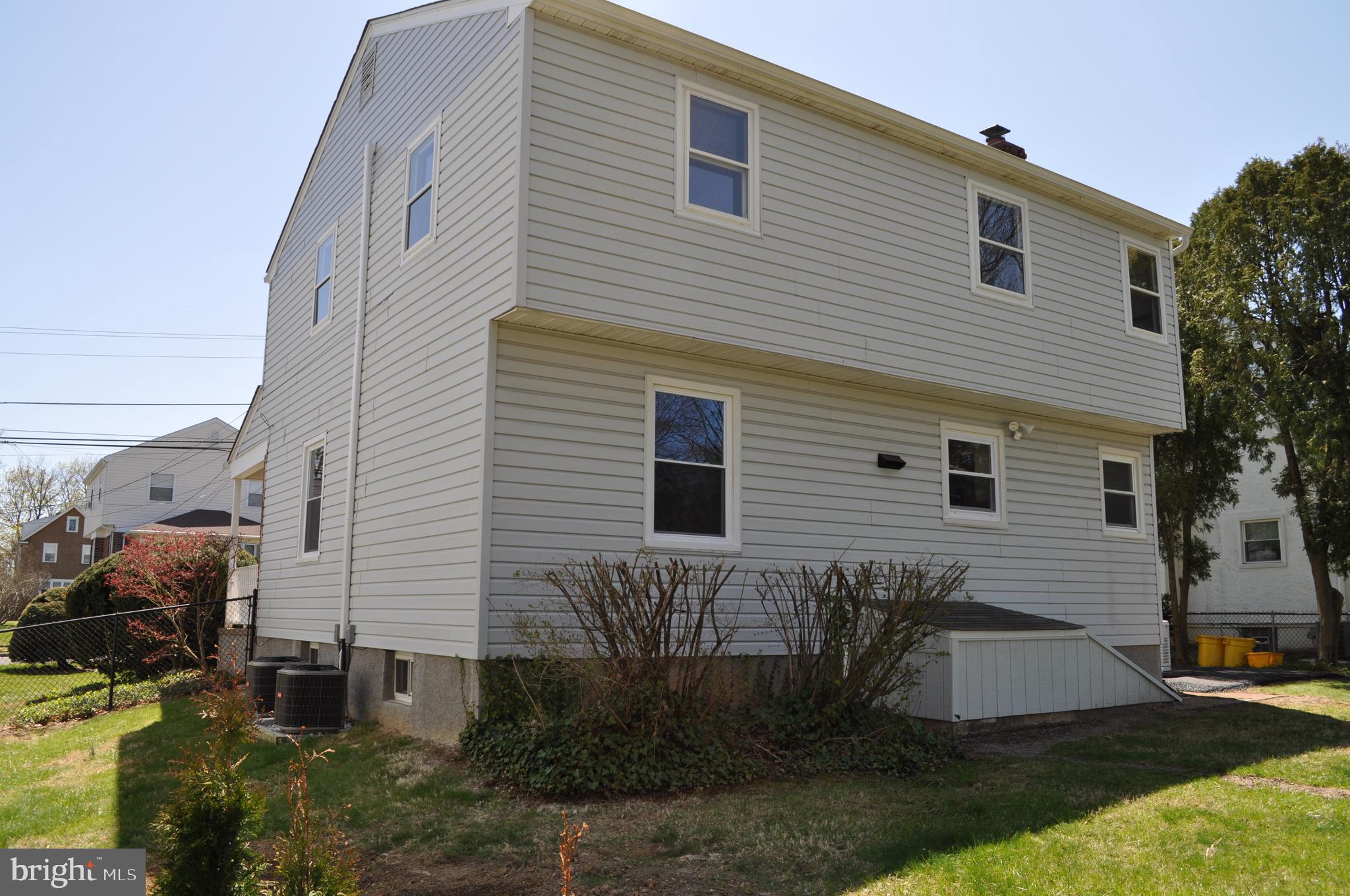 158 South Highland Road Springfield, PA 19064 - Photo 40 of 46 a view of a house with backyard and sitting area