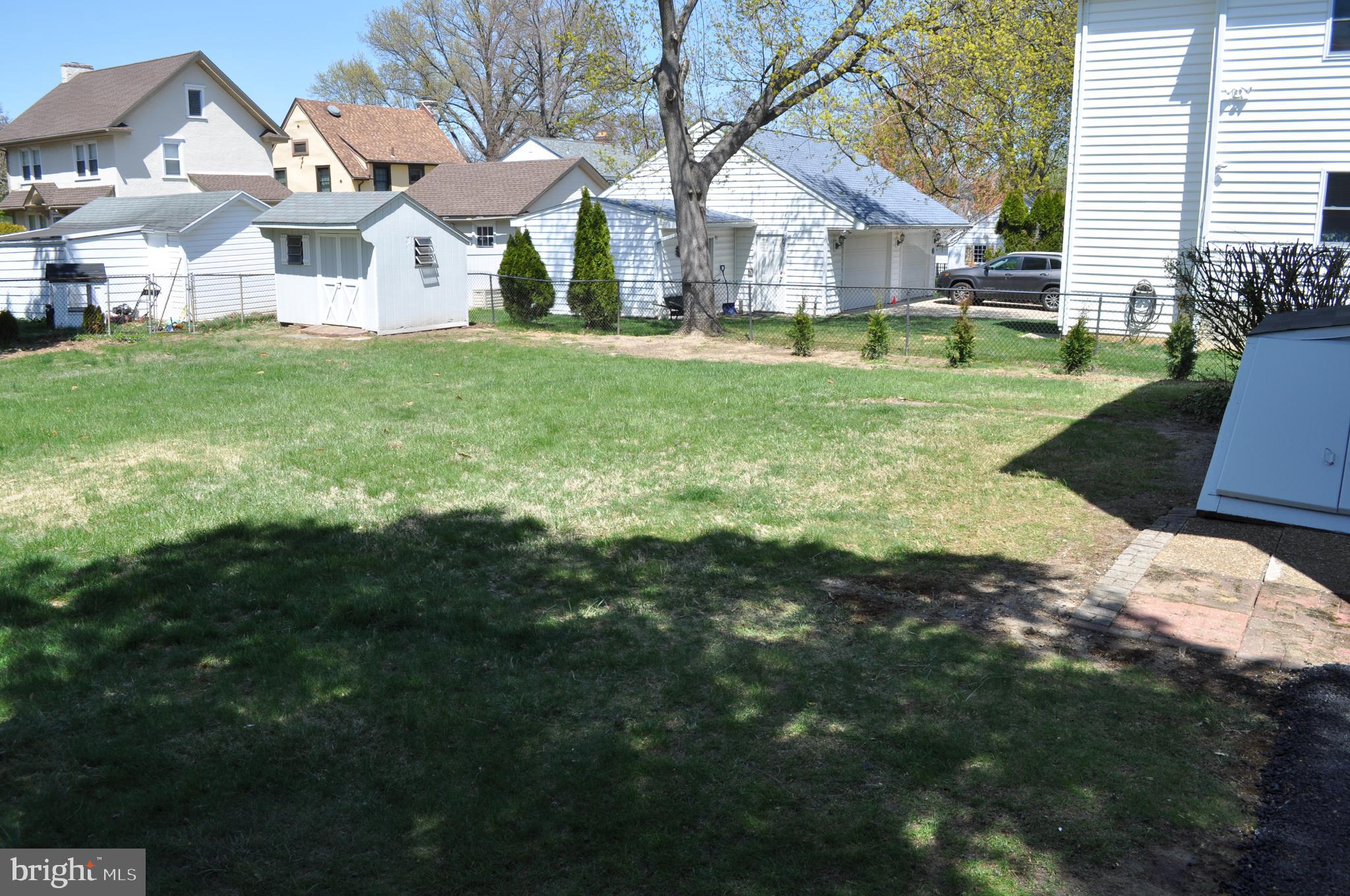 158 South Highland Road Springfield, PA 19064 - Photo 44 of 46 a view of a house with a big yard and large trees