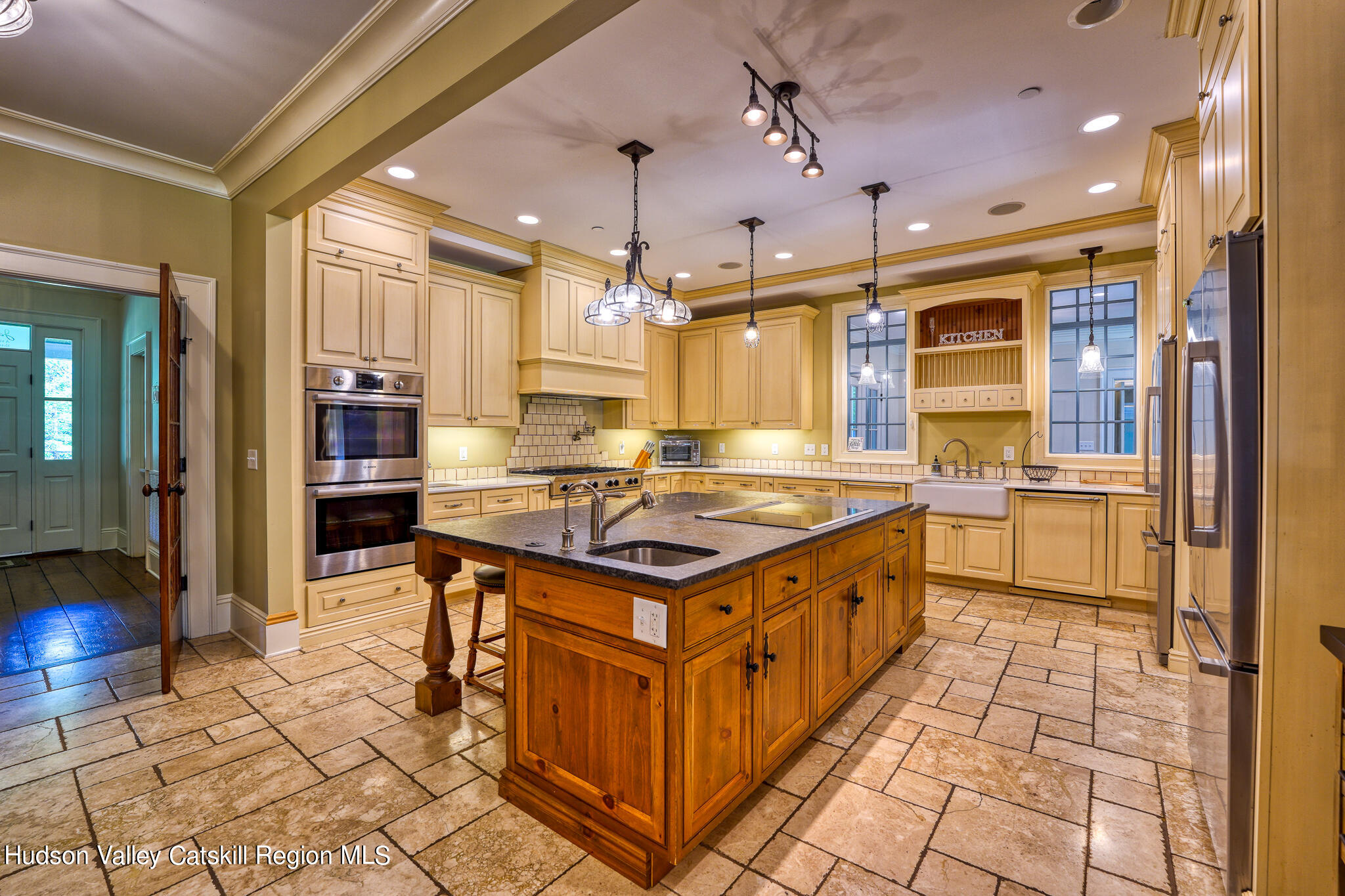 103 Carney Road Ulster Park, NY 12487 - Photo 12 of 89 a kitchen with stainless steel appliances granite countertop a stove and a refrigerator