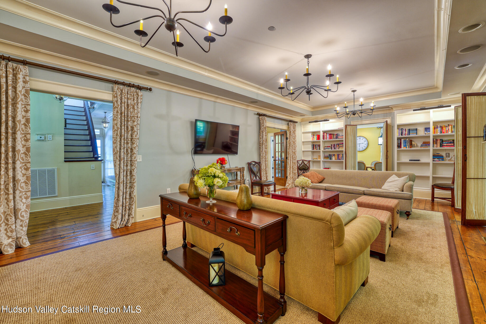 103 Carney Road Ulster Park, NY 12487 - Photo 24 of 89 a living room with fireplace furniture and a flat screen tv